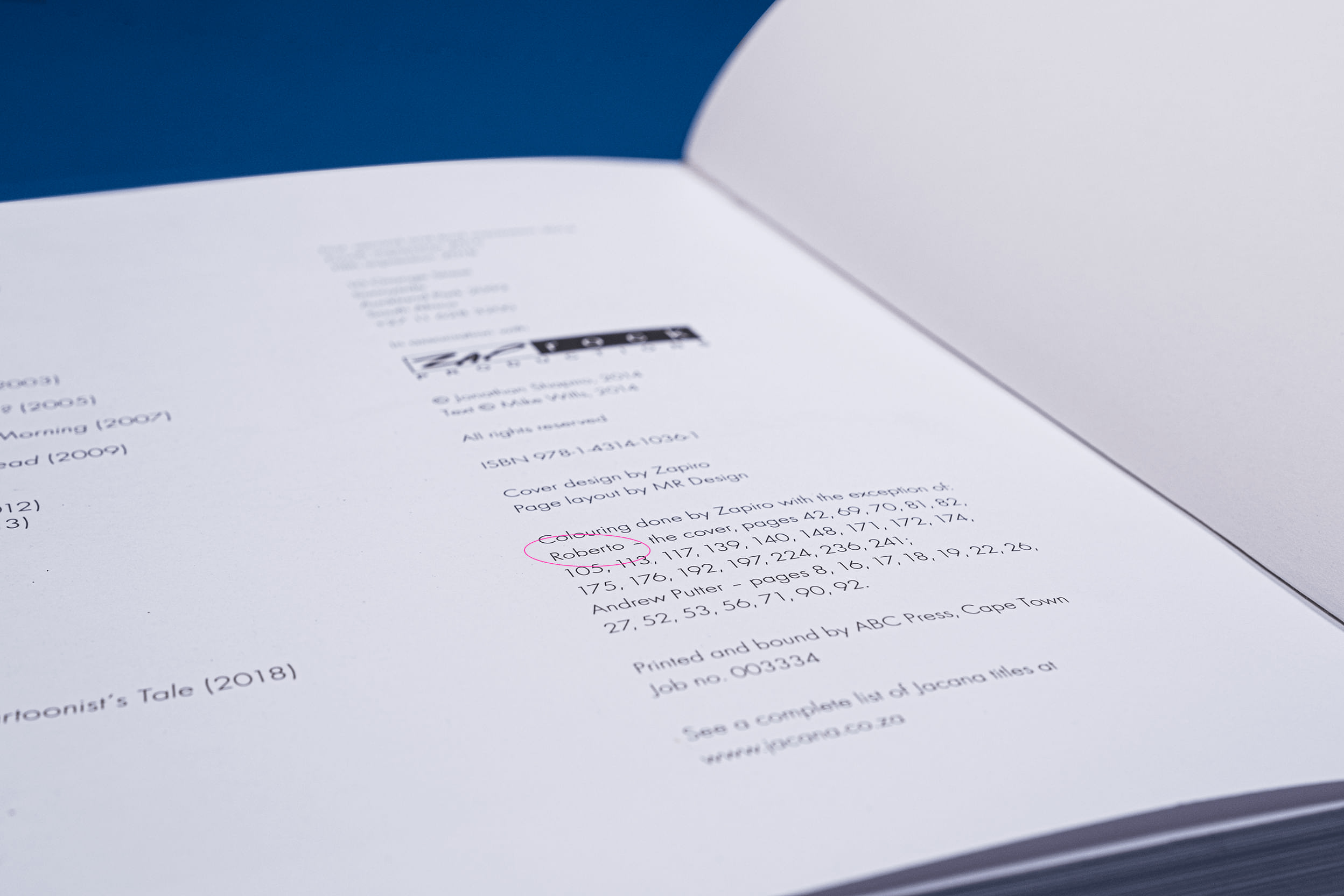 Photograph by Roberto Millan & millantv of Democrazy credit page, a Zapiro annual cartoon anthology.